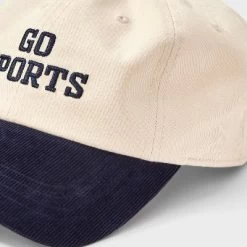 Go Sports Two-Toned Baseball Hat - Universal Thread™ Beige/Navy Blue -Universal Thread Shop GUEST 9ef6d3bd 2c17 42c9 b205 f19c24b479be